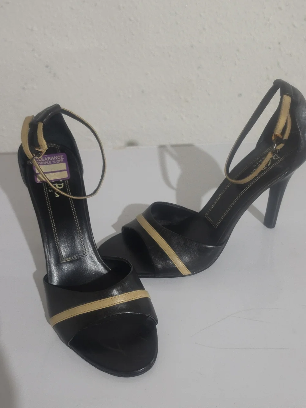 BCBG Black Leather Heels with Gold Trim Ankle-Strap Sandals